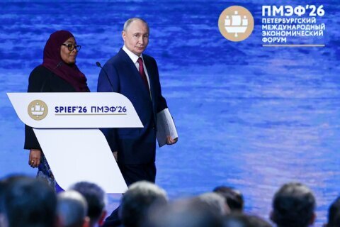 Putin slams Western sanctions as damaging to the global economy
