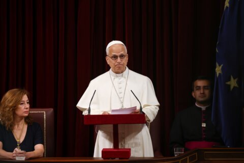 Pope’s historic speech to Spain’s parliament demands respect for migrants and gets 7-minute ovation