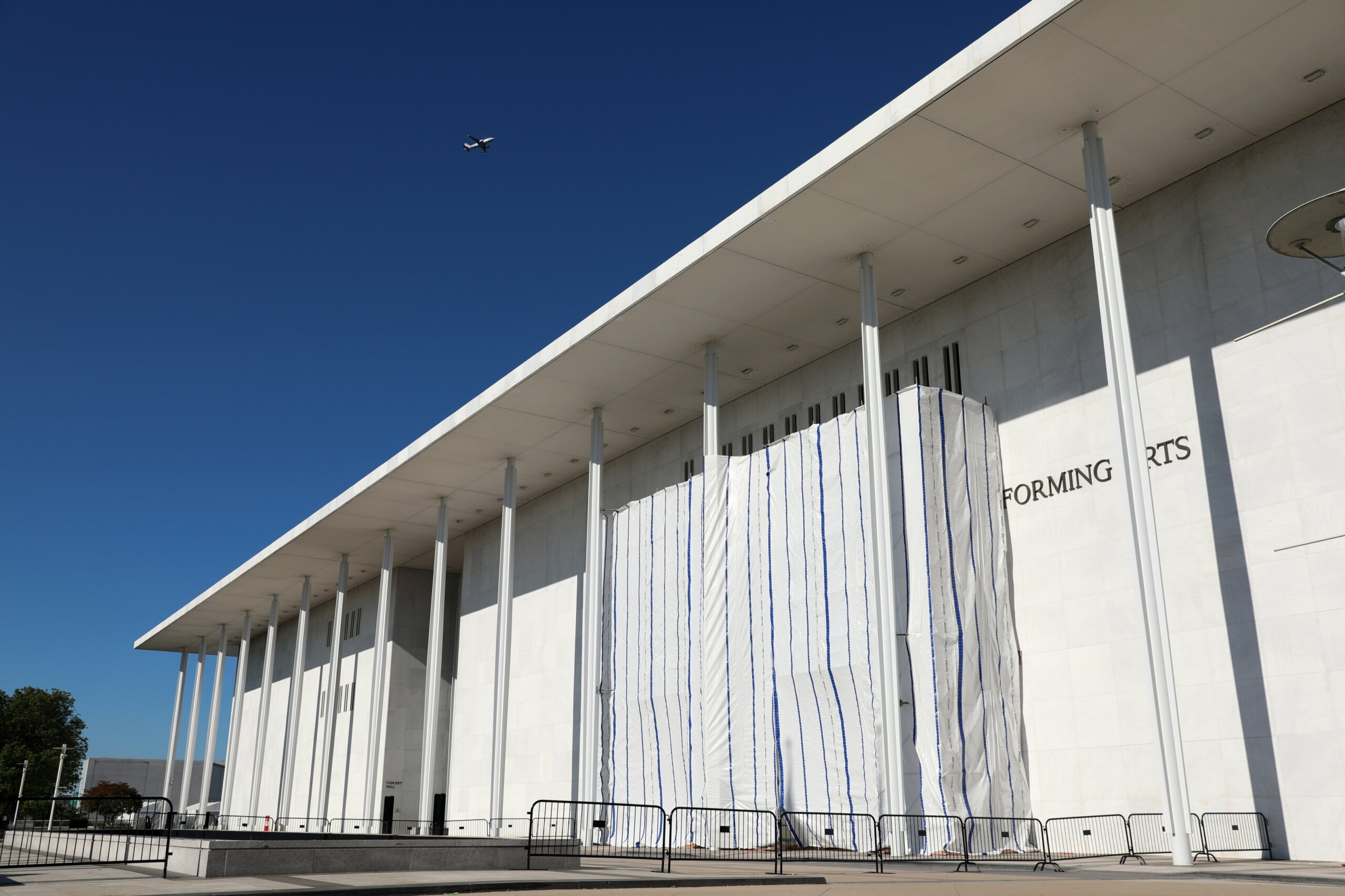 PHOTOS: What’s under the tarp? Kennedy Center facade covered after Trump’s name removed