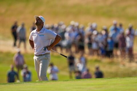 Wyndham Clark quiets a US Open crowd that rooted for him to lose