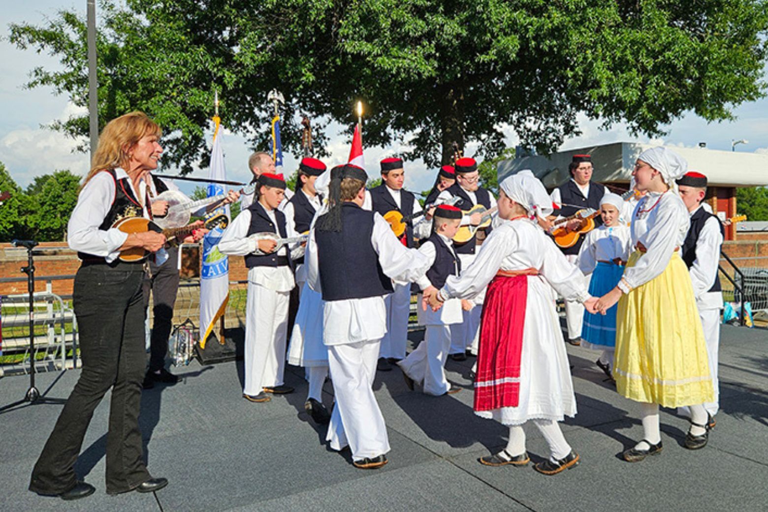 dancers and musicians perform