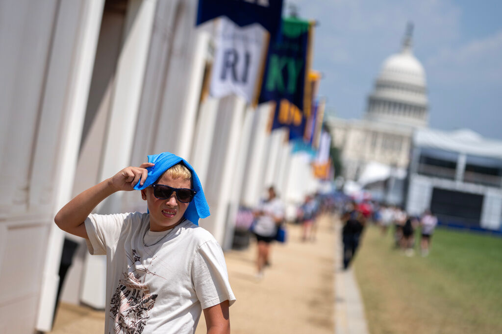 The D.C. area is under a Heat Advisory and Code Purple Air Quality Alert Sunday, with heat index values up to 105 and storms possible.
