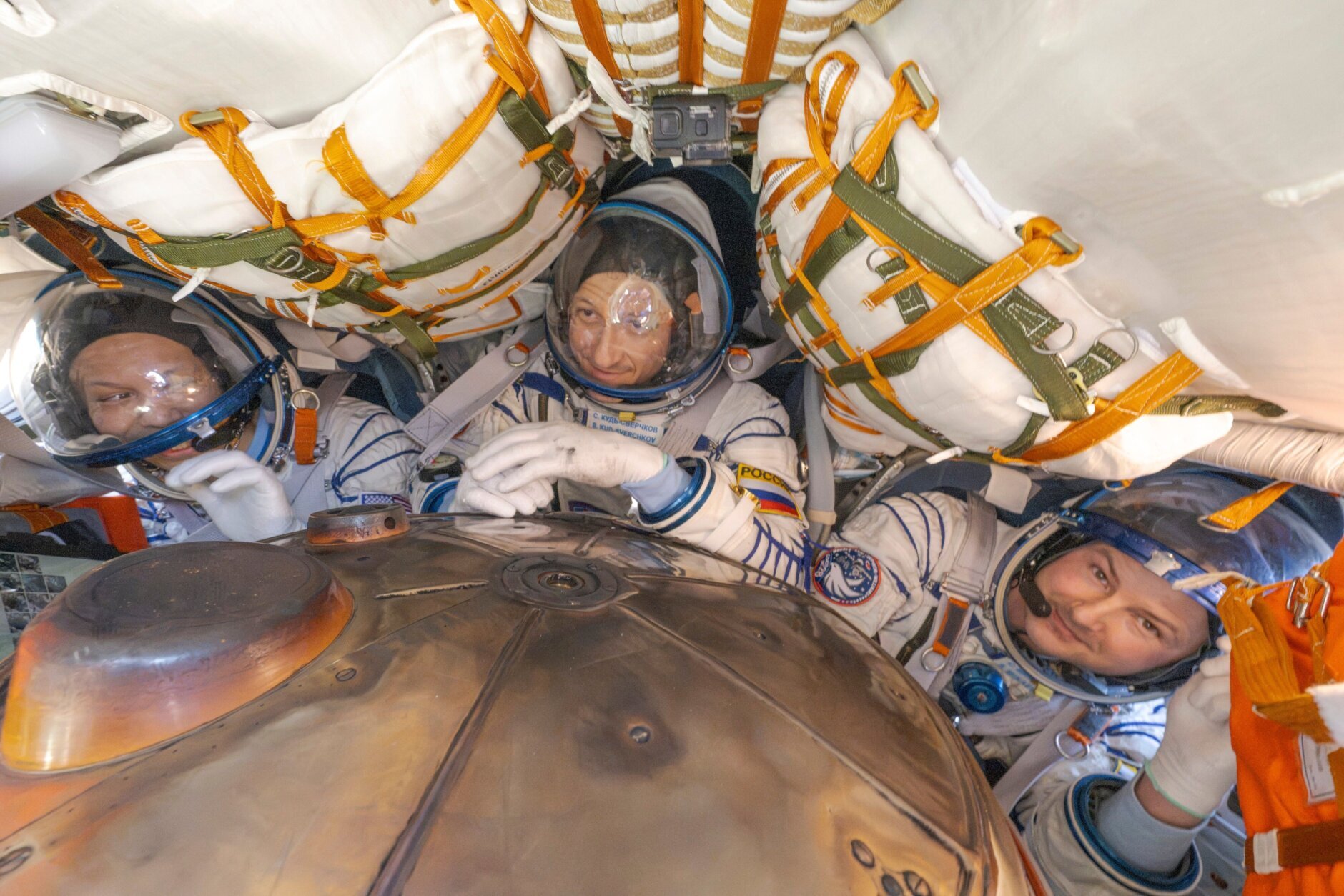 NASA astronaut Chris Williams alongside Russian cosmonauts