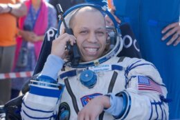 NASA astronaut Chris Williams is seen outside the Soyuz MS-28 spacecraft after he landed with Expedition 74 Roscosmos cosmonauts Sergey Kud-Sverchkov, and Sergei Mikaev in a remote area near the town of Zhezkazgan, Kazakhstan on Sunday, July 26, 2026. (Bill Ingalls/NASA via AP)