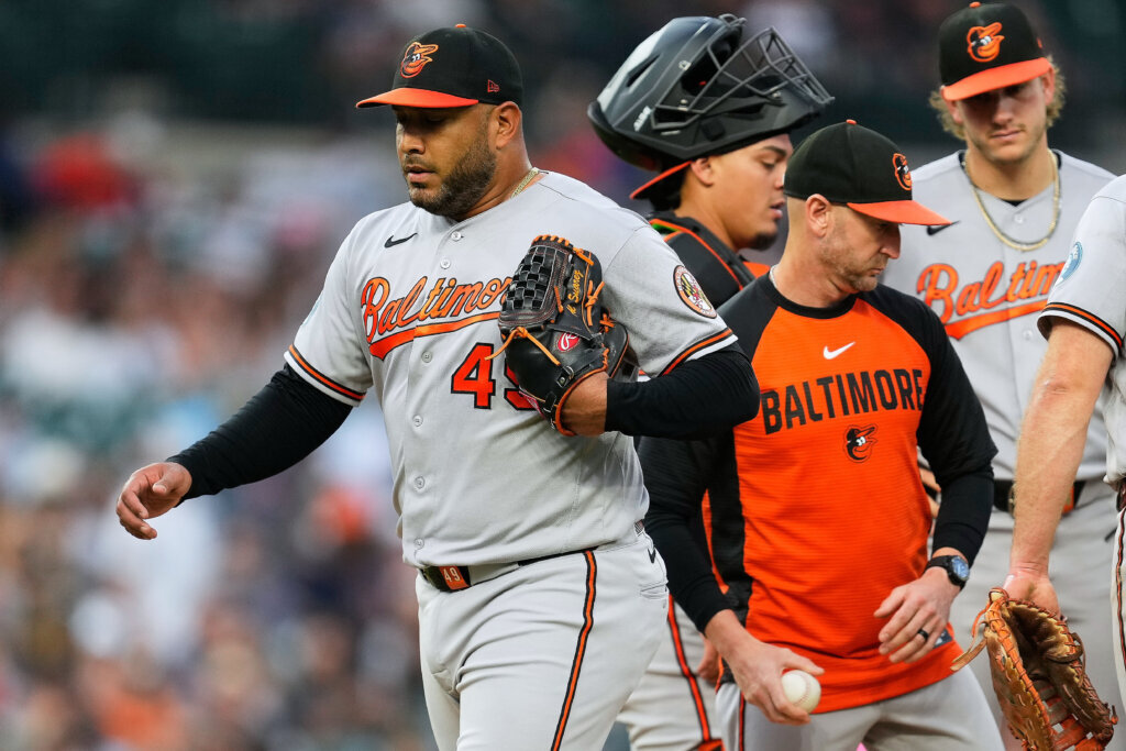 Phillies rout Orioles 8-0 in a game called by rain after 5 1/2 innings