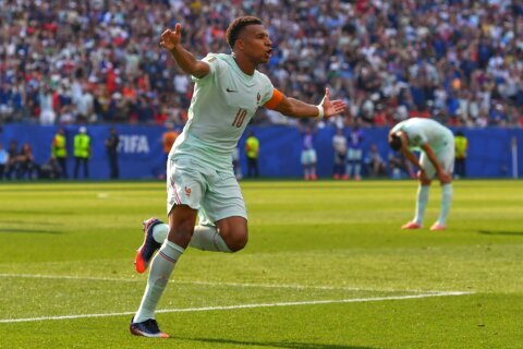 Kylian Mbappé scores his 8th World Cup goal before leaving game with a ‘slight’ ankle injury