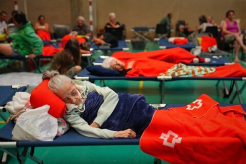 Wildfires in Spain and southern France force tens of thousands to evacuate