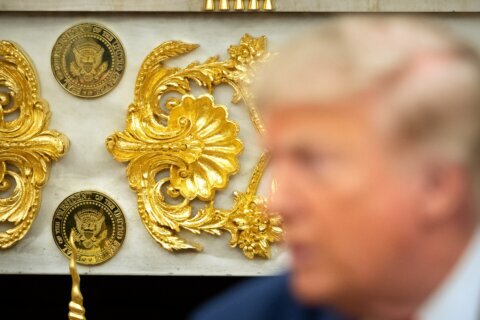 The Latest: Trump will attend dignified transfer of 4 US service members killed in the Middle East