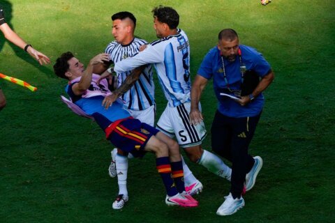 Spain’s on-field World Cup celebrations marred by scuffles with Argentina players