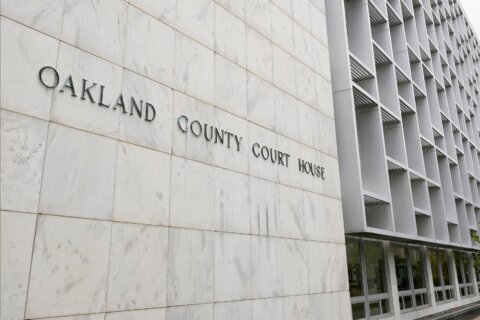 Michigan woman pleads no contest to abuse after 3 kids are found living alone for years