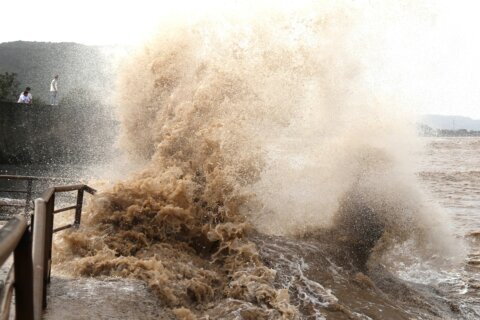 Typhoon Bavi weakens but brings strong winds and rain to China as more than 2 million evacuated
