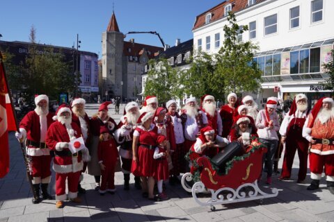 Ho, ho, hot: Santas gather for a summer celebration