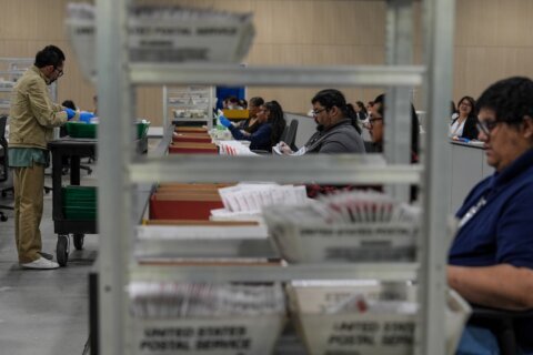 Democratic governors press US Postal Service to drop plan tied to Trump’s election order