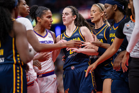 INDIANAPOLIS, INDIANA - JUNE 22: Alyssa Thomas #25 of the Phoenix Mercury and Caitlin Clark #22 of the Indiana Fever get into a scuffle during the game at Gainbridge Fieldhouse on June 22, 2026 in Indianapolis, Indiana.  (Photo by Michael Hickey/Getty Images)