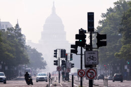 A colored haze over the U.S. Capitol Building on July 17, 2026 in Washington, D.C. as smoke from wildfires reduces air quality.
