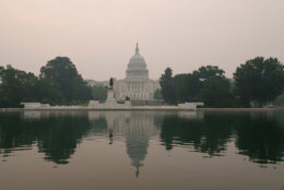 WASHINGTON, DC - JULY 17: The U.S. Capitol building is reflected in the Capitol Reflecting Pool as smoke from wildfires in Canada shrouds the air on July 17, 2026 in Washington, DC.  Authorities are continuing to monitor for unsafe conditions as air quality alerts are in effect across a vast portion of the United States. (Photo by Kevin Carter/Getty Images)