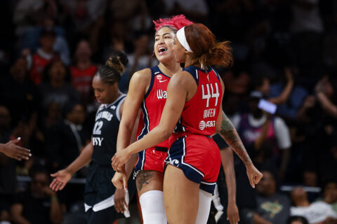 Austin scores 25, has go-ahead 3-point play as Mystics shock Aces 100-99