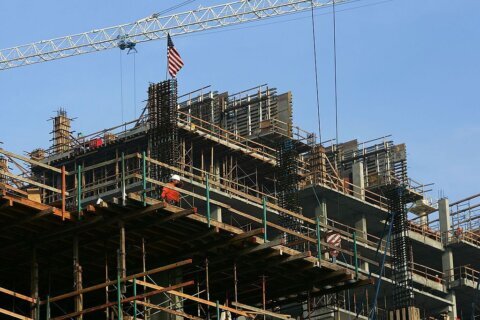 LOS ANGELES - DECEMBER 15:  Construction of new high-rise loft buildings continues as an outgrowth of the current development of the mega-project L.A. Live entertainment complex blocks away, next to Staples Center sports arena, on December 15, 2006 in Los Angeles, California. A boom in mega-projects including the L.A. Live entertainment complex and Grand Avenue developments downtown and a major expansion of Universal City at a combined cost of $7.5 billion could reshape the way Los Angeles grows. Residents of these communities are expected to have fewer reasons use their cars but critics fear that the sheer size of the projects will create traffic gridlock in the areas. The mixed-use L.A. Live "sports-entertainment" hub alone will include a convention center, next to the Los Angeles Convention Center, a 7,100-seat theater, 14-screen movie theater, luxury condominiums, a hotel, restaurants, and clubs, spurring a flurry of major residential loft building projects throughout the South Park area that surrounds it.  (Photo by David McNew/Getty Images)