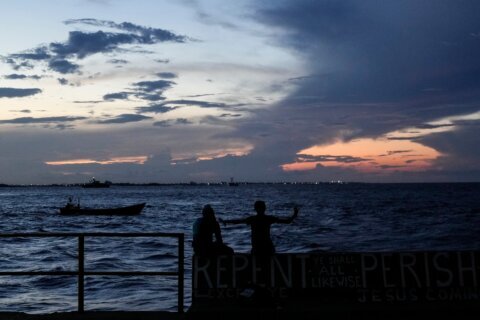 A ferry carrying 116 people capsizes off Guyana, with 67 rescued as search continues