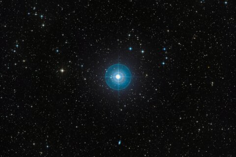 Faint new planet is revealed around a young star after a decade in hiding