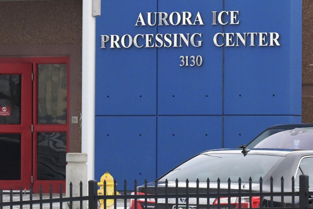 Off-duty employee arrested in shooting near ICE detention center in Colorado that injured a woman