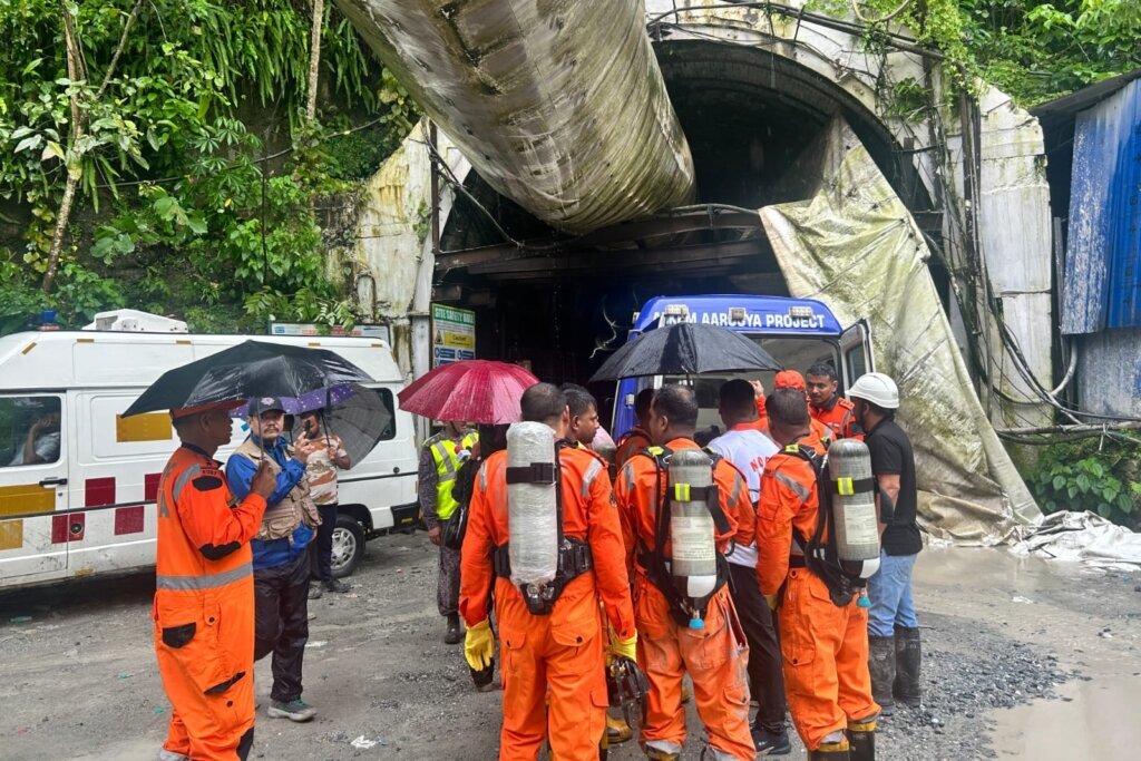 Toxic gas slows efforts to rescue 13 workers trapped in India hydropower tunnel