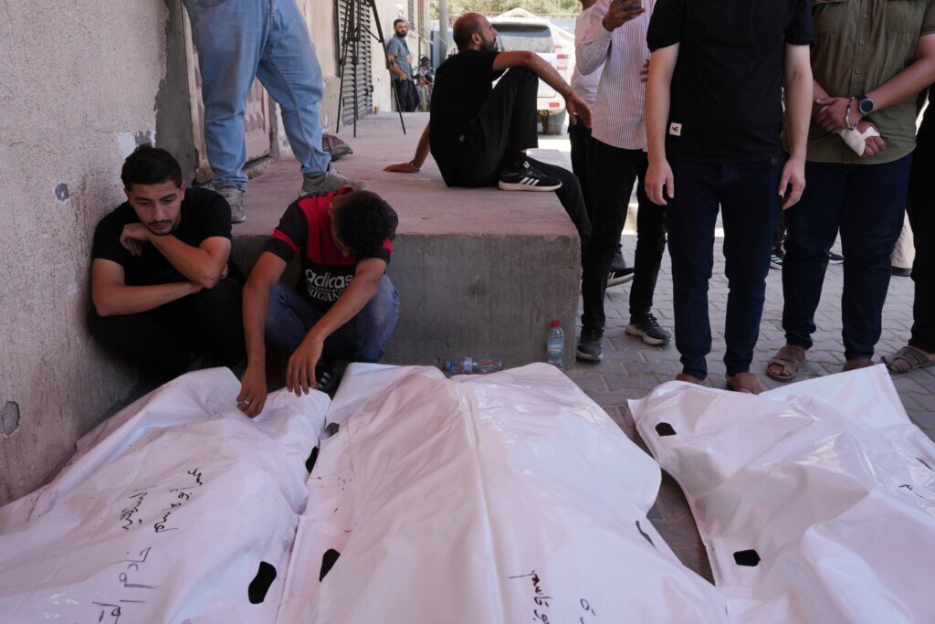 Israel’s latest strikes kill a dozen people in Gaza including police officers