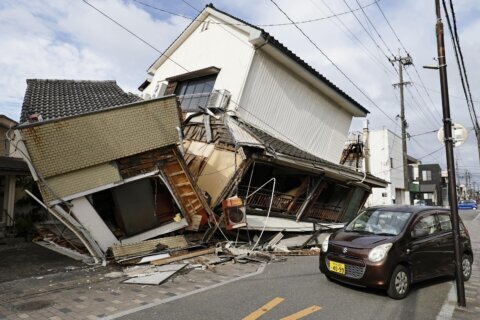 Rescuers search for the missing after Japan earthquake as death toll rises to 13