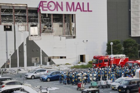 Death toll from southwestern Japan quake climbs to 34 as rescuers again search damaged mall