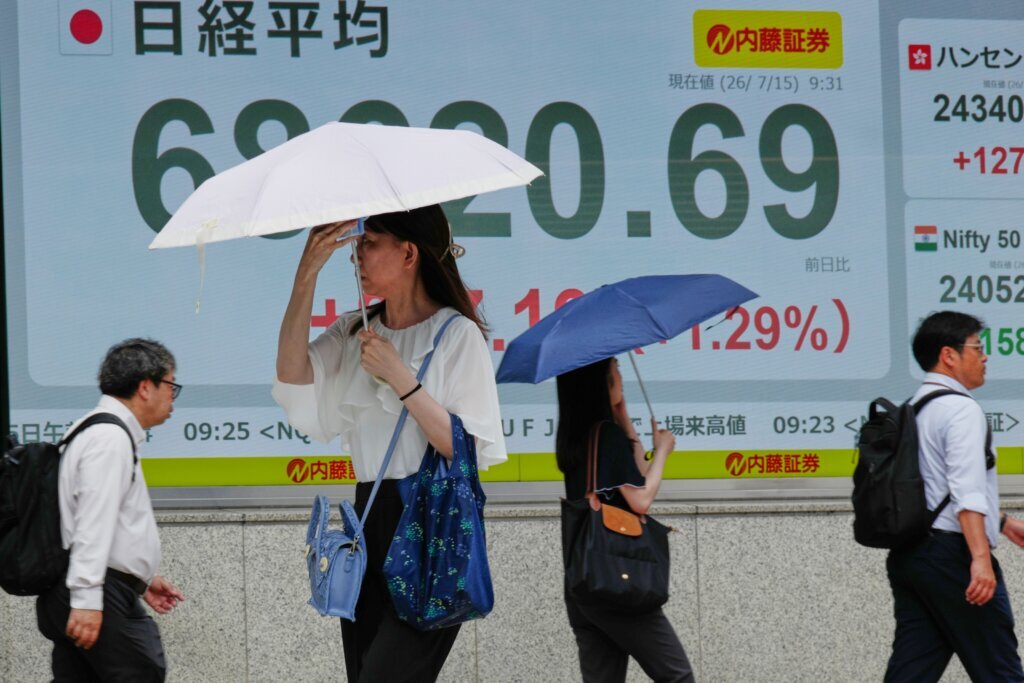 Asian shares sink, with Tokyo down more than 5% as slumping AI stocks drag world markets lower