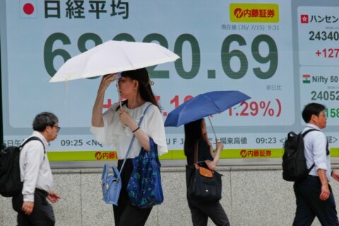 Asian shares sink, with Tokyo down more than 5% as slumping AI stocks drag world markets lower