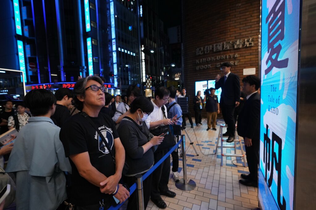 Fans mark the release of new Haruki Murakami novel at a midnight event in Tokyo