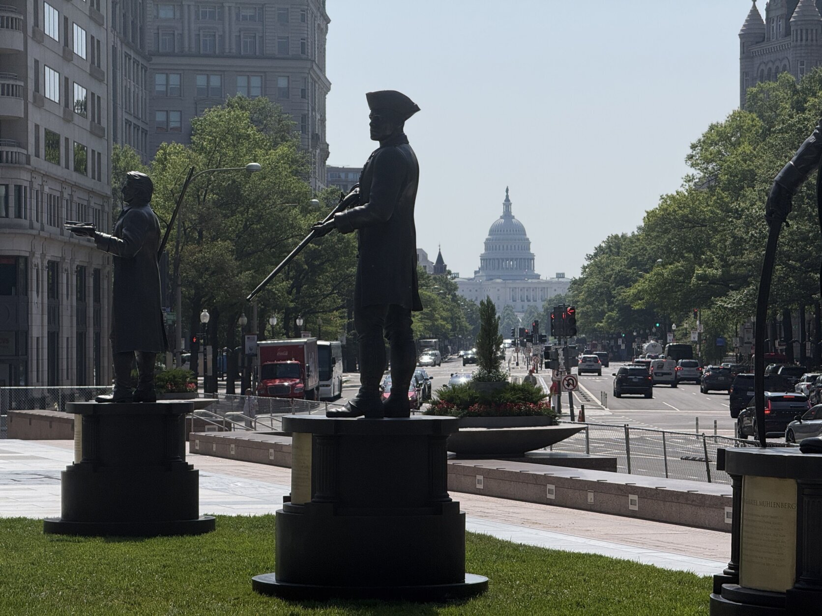 statues in urban plaza