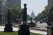 statues in urban plaza