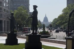 statues in urban plaza