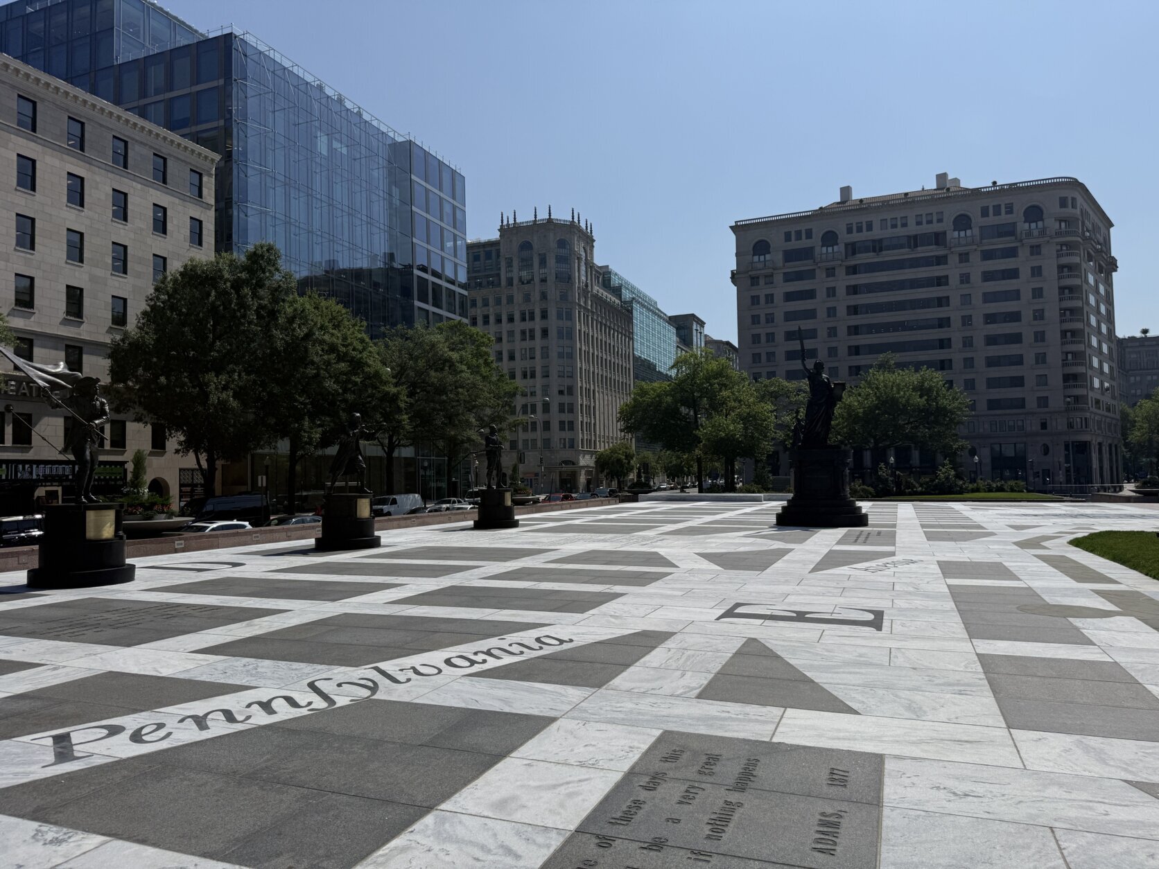 statues in urban plaza