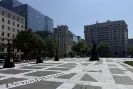 statues in urban plaza