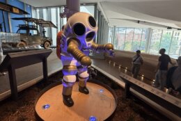 astronaut suit on mannequin on display in museum