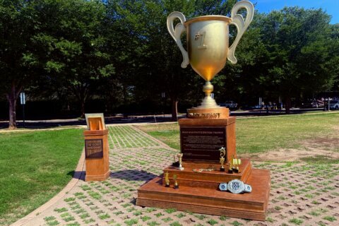 New protest art mocks Trump with a 10-foot ‘Iran War Participation Trophy’