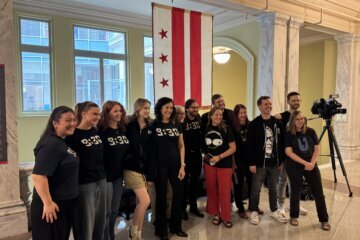 Supporters of the D.C. Council's RESALE Act, including individuals with D.C.-area concert venue operator I.M.P., on July 14, 2026. 