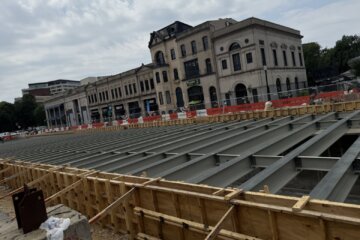 Crews are continuing work to construct a pedestrian walkway over a stretch of Connecticut Avenue in the immediate vicinity of Dupont Circle in D.C.