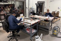 Preservationists work on the gunboat Philadelphia