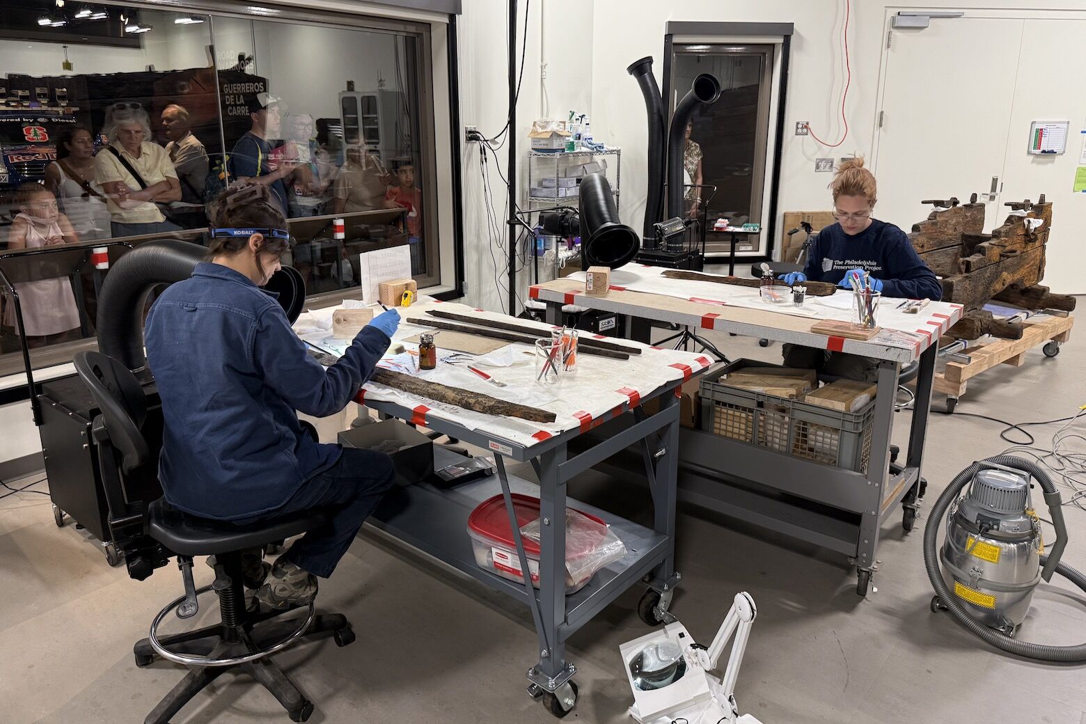 Preservationists work on the gunboat Philadelphia