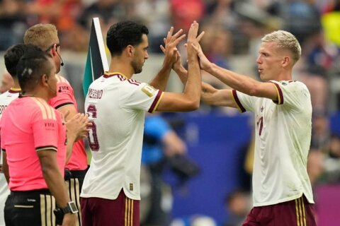 Spain practices outside before the World Cup final as smoke fills the air in northern New Jersey