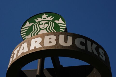 Starbucks reports strong quarterly sales and raises annual outlook