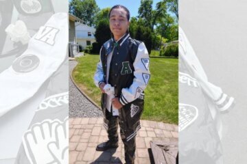 Aiden Mattauszek poses in the duct tape prom suit that made him a finalist for a $10,000 Duck Tape scholarship. (Courtesy Aiden Mattauszek)