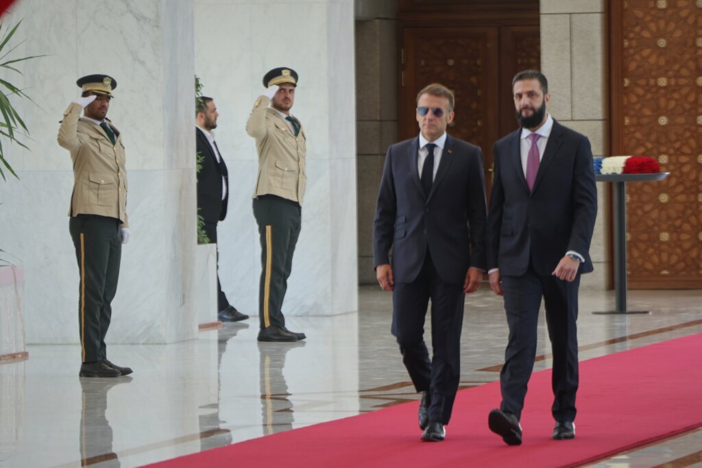 Explosions rock Damascus, wounding 4, as French President Macron visits Syria