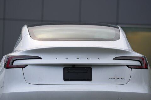 Earnings at Musk’s car company fall as research spending cut into profit from selling cars