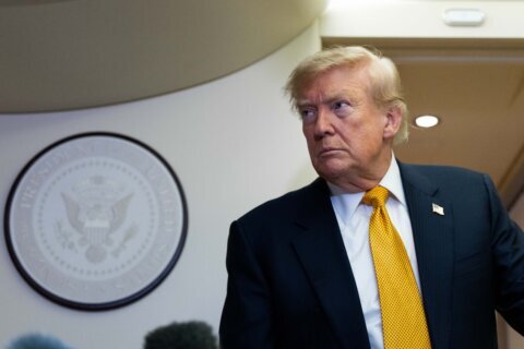 The Latest: 8 men indicted in planned attack on White House UFC cage-fighting show