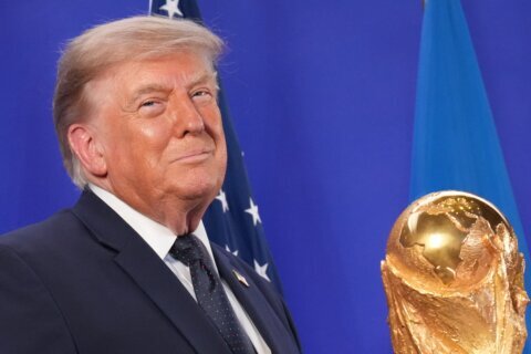 Trump celebrates the World Cup as a US victory as he prepares to present trophy to the winning team
